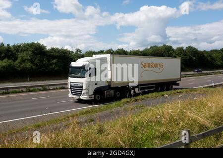 A Sainsbury`s lorry on the M40 motorway, Warwickshire, England, UK Stock Photo